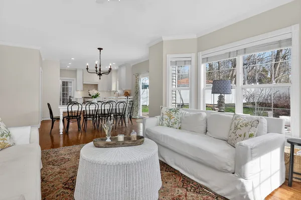 a living room with furniture and a table