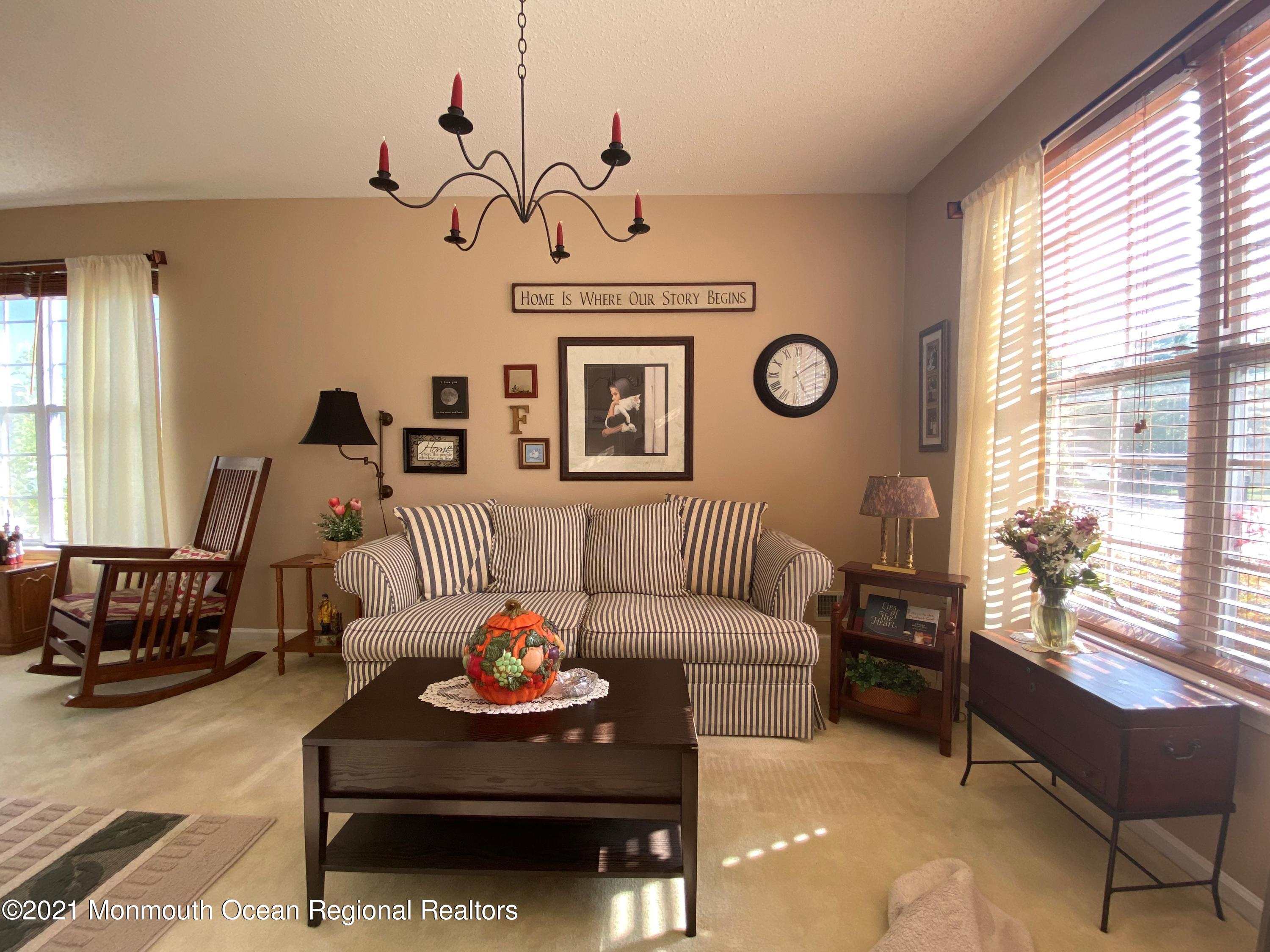 47 Sandpiper Road Barnegat, NJ 08005 - Photo 5 of 15 a living room with furniture and a large window