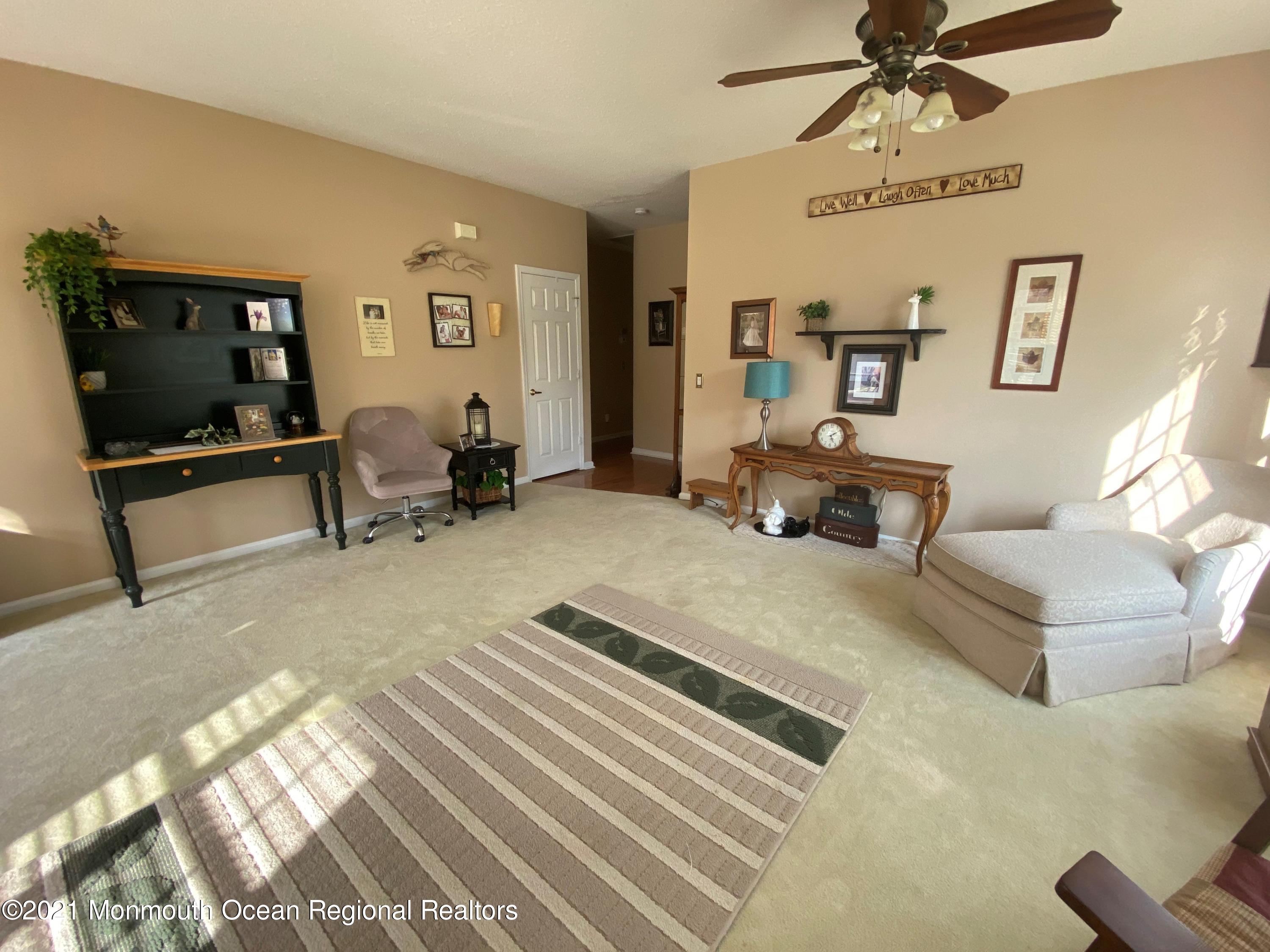 47 Sandpiper Road Barnegat, NJ 08005 - Photo 6 of 15 a bedroom with furniture and a flat screen tv