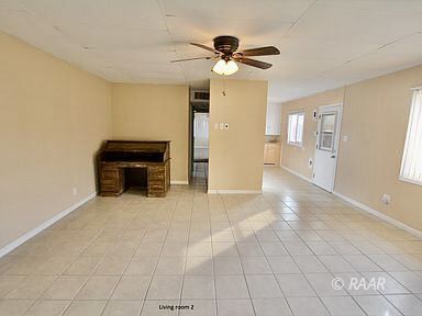 828 North Balsam Street Ridgecrest, CA 93555 - Photo 14 of 32 a view of livingroom with workspace