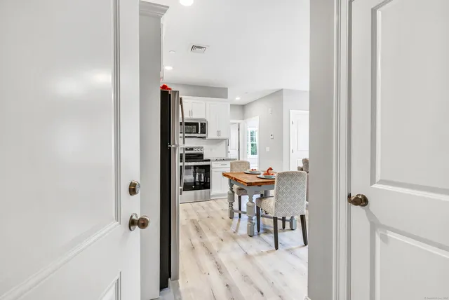 a view of a room with breakfast area
