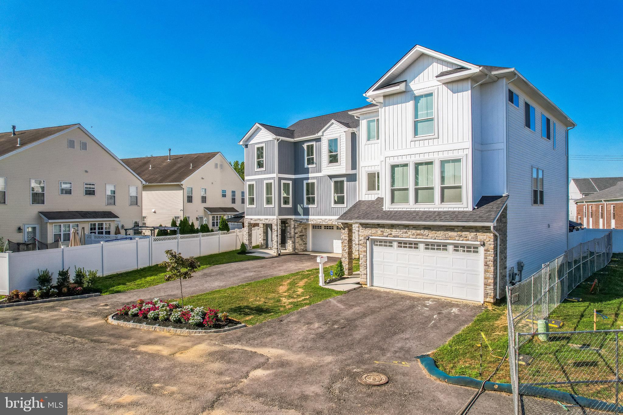 9838-44 Legion Street, Unit 5 Philadelphia, PA 19114 - Photo 4 of 8 a front view of a house with garden