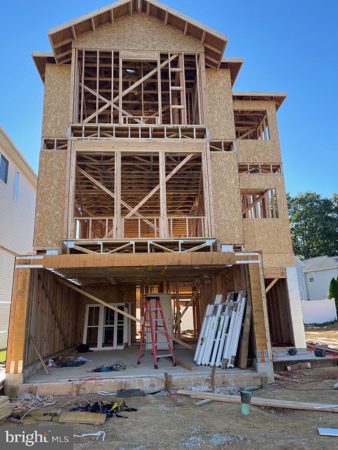 9838-44 Legion Street, Unit 5 Philadelphia, PA 19114 - Photo 7 of 8 a tall building with large windows
