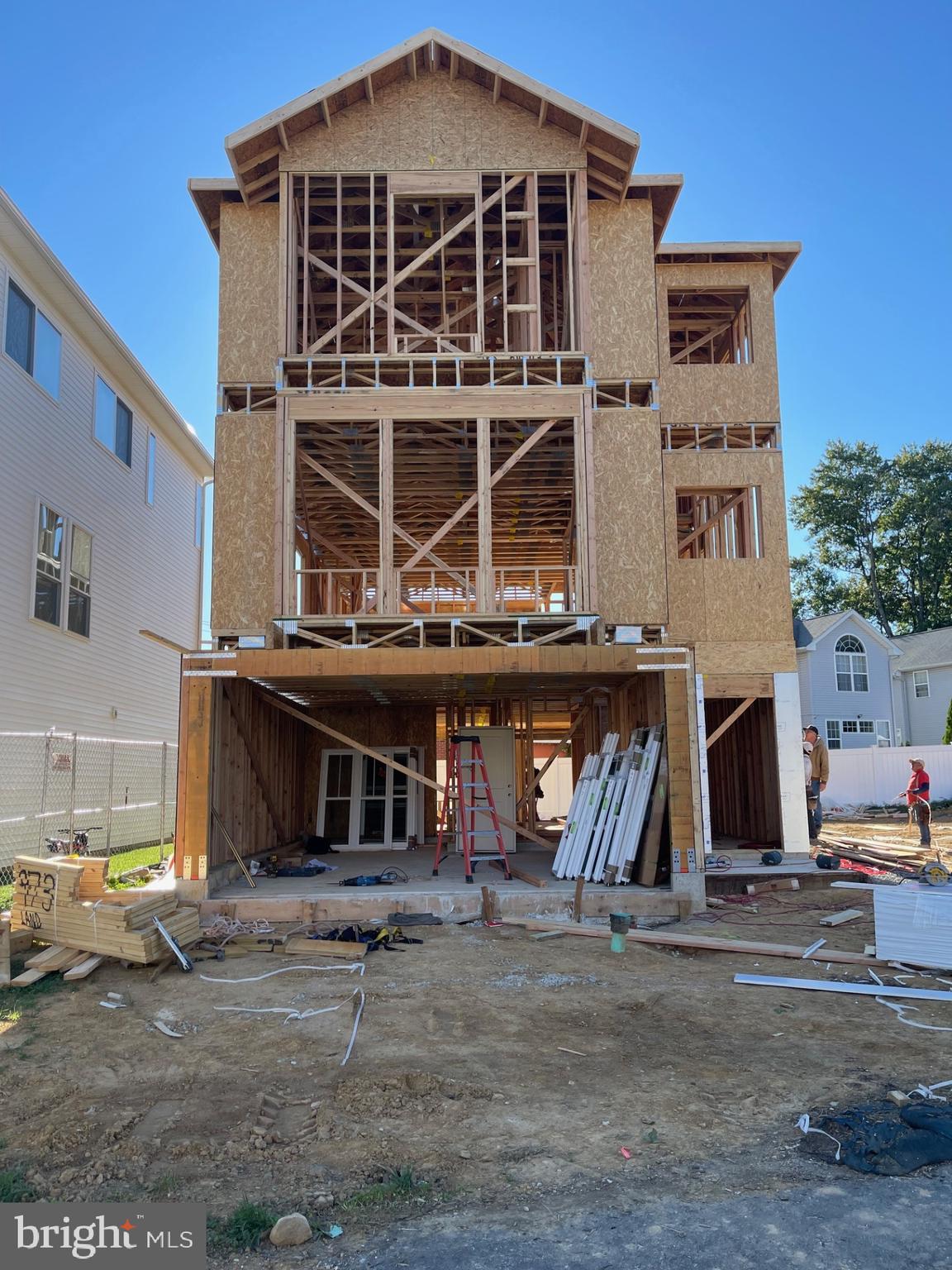 9838-44 Legion Street, Unit 5 Philadelphia, PA 19114 - Photo 8 of 8 a front view of a building with large windows