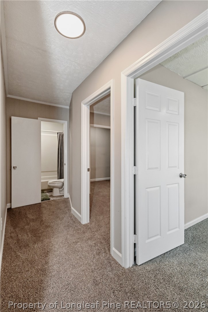 5307 Cypress Road Fayetteville, NC 28304 - Photo 20 of 36 an empty room with closet and a bathroom