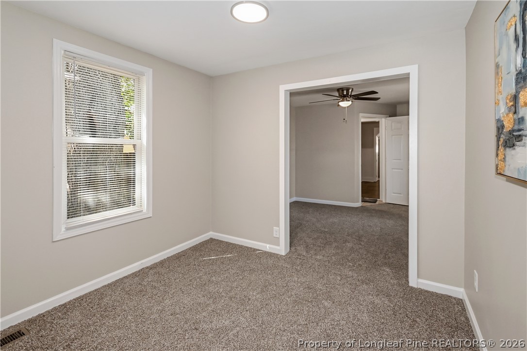 5307 Cypress Road Fayetteville, NC 28304 - Photo 26 of 36 an empty room that has a window