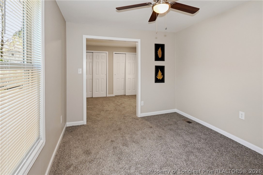 5307 Cypress Road Fayetteville, NC 28304 - Photo 28 of 36 a view of an empty room with a window