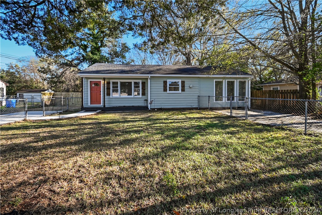 5307 Cypress Road Fayetteville, NC 28304 - Photo 33 of 36 a view of a house with a yard