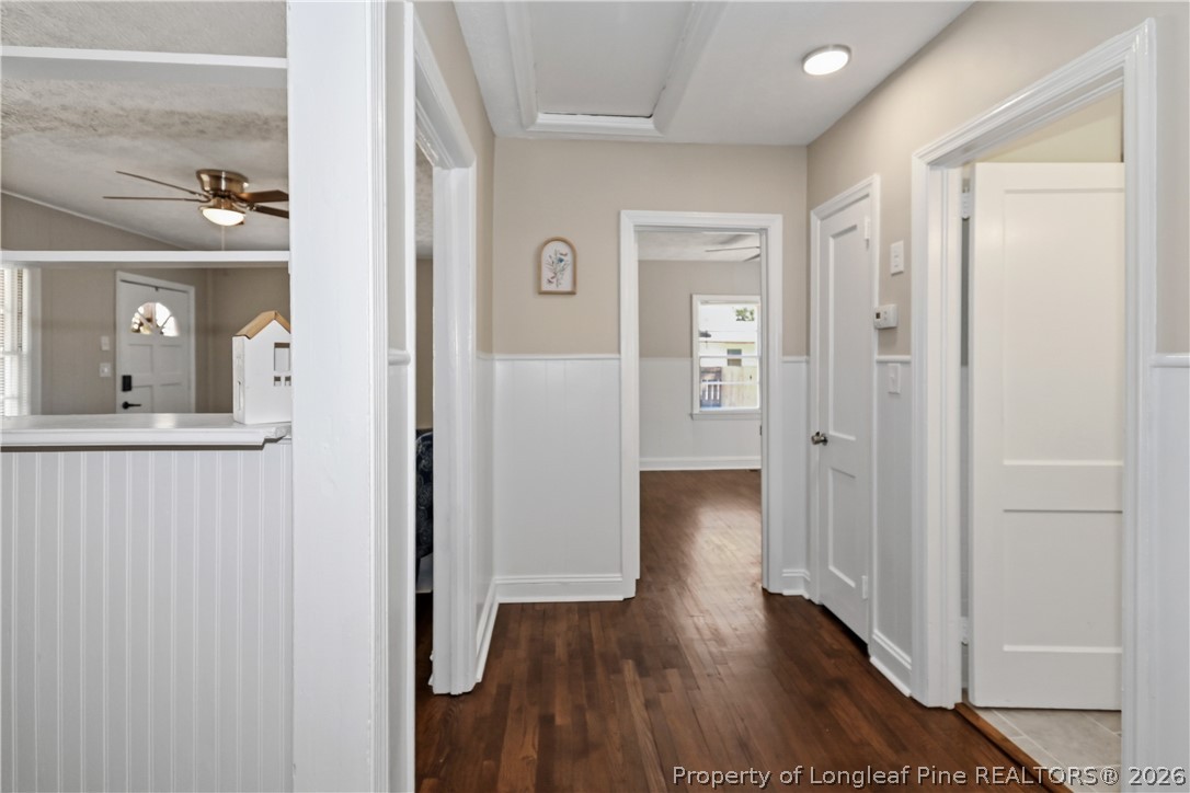 5307 Cypress Road Fayetteville, NC 28304 - Photo 6 of 36 a view of a hallway with wooden floor