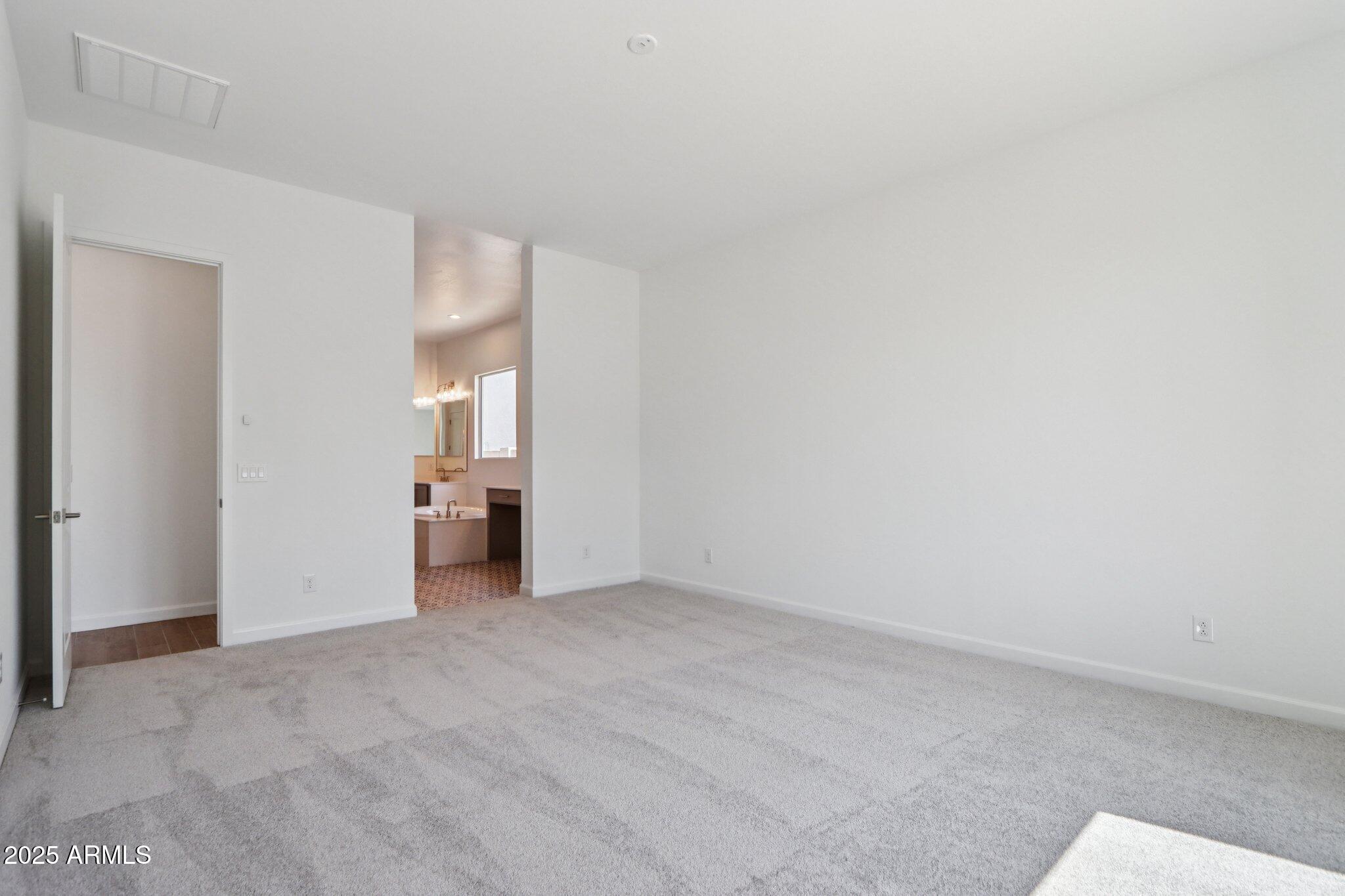 11417 East Utah Avenue Mesa, AZ 85212 - Photo 33 of 55 a view of empty room with wooden floor