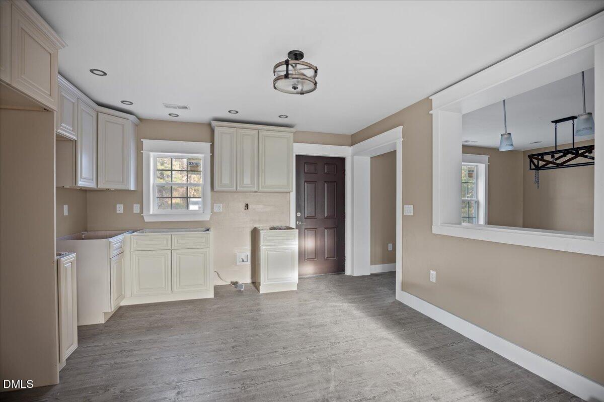 413 South Main Street Princeville, NC 27886 - Photo 11 of 21 a view of kitchen with furniture and window