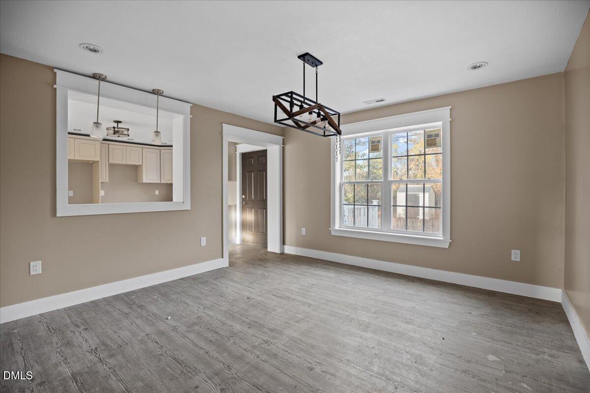 413 South Main Street Princeville, NC 27886 - Photo 9 of 21 a view of an empty room with a window
