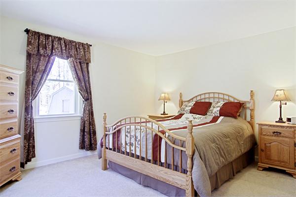 253 Liberty Square Road Boxborough, MA 01719 - Photo 14 of 21 a bedroom with a bed next to a window