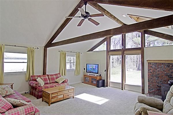 253 Liberty Square Road Boxborough, MA 01719 - Photo 8 of 21 a living room with furniture and a large window