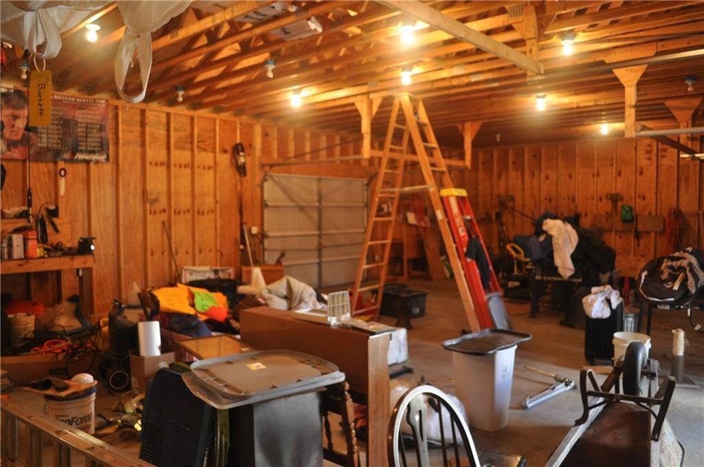 87 Back Road Abbot, ME 04406 - Photo 22 of 35 Interior of garage