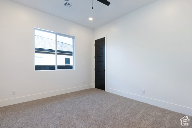 3145 Snow Cyn Road Hurricane, UT 84737 - Photo 23 of 38 Empty room with light colored carpet, ceiling fan, and recessed lighting