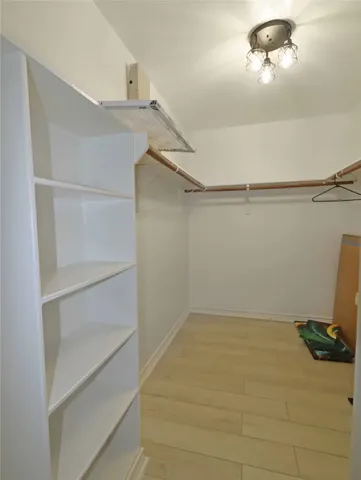 a view of a room with racks on the wall