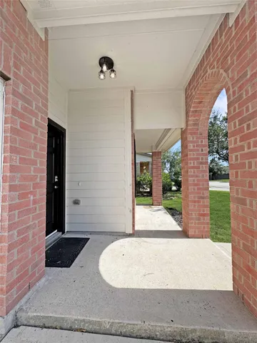 a view of a entryway door front of house