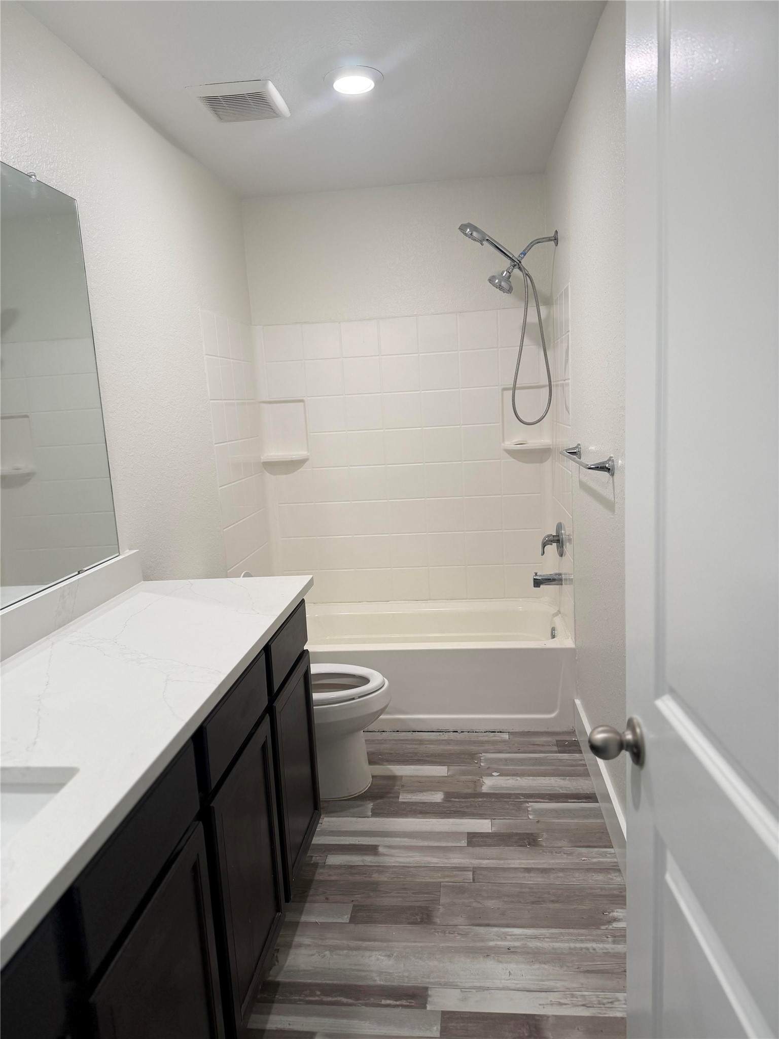 8419 Hannah Rd Cove Cove, TX 77523 - Photo 10 of 28 a bathroom with a sink a toilet and shower