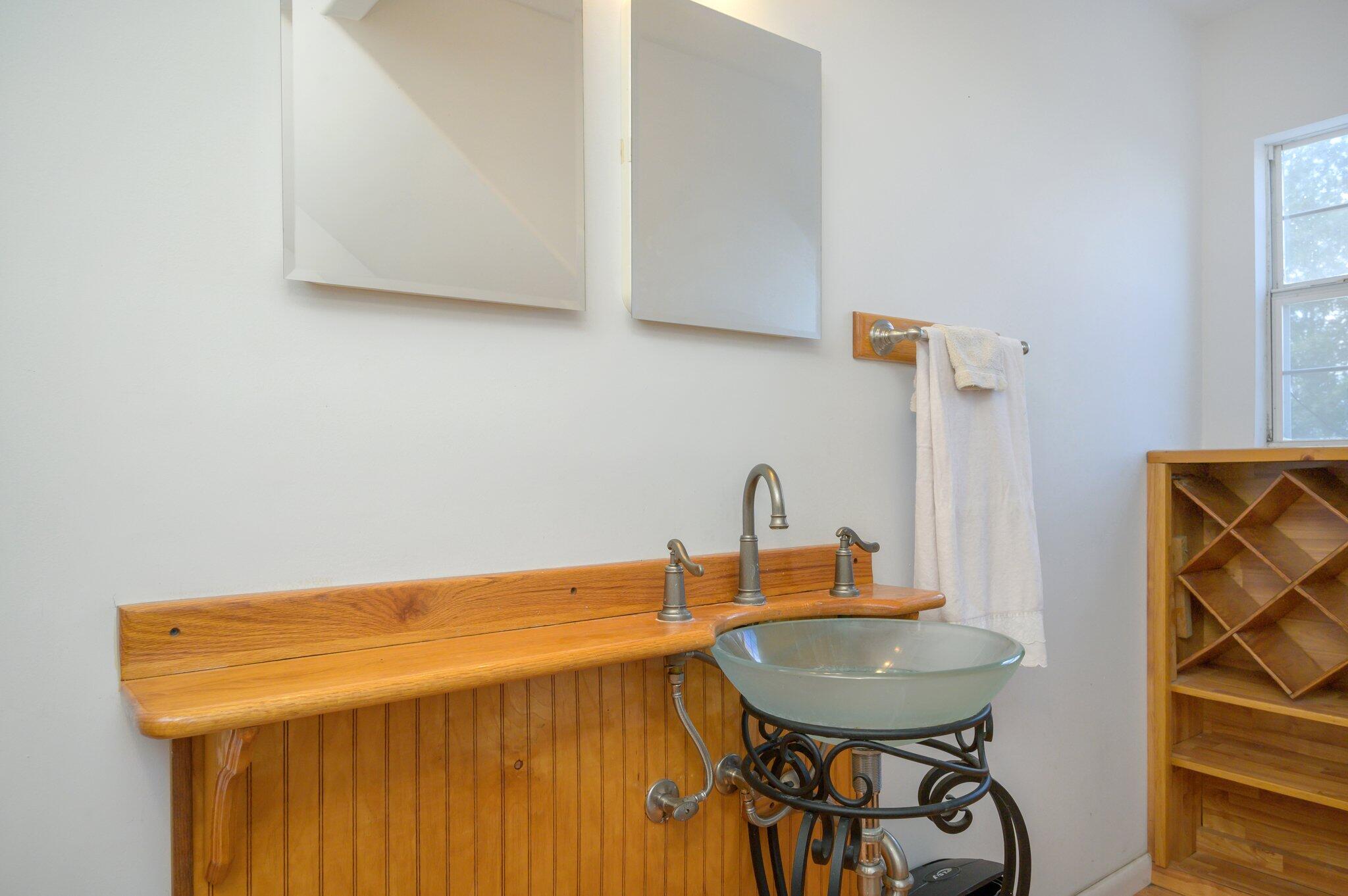 1361 Long Road DeFuniak Springs, FL 32433 - Photo 21 of 43 a bathroom with a sink and a mirror