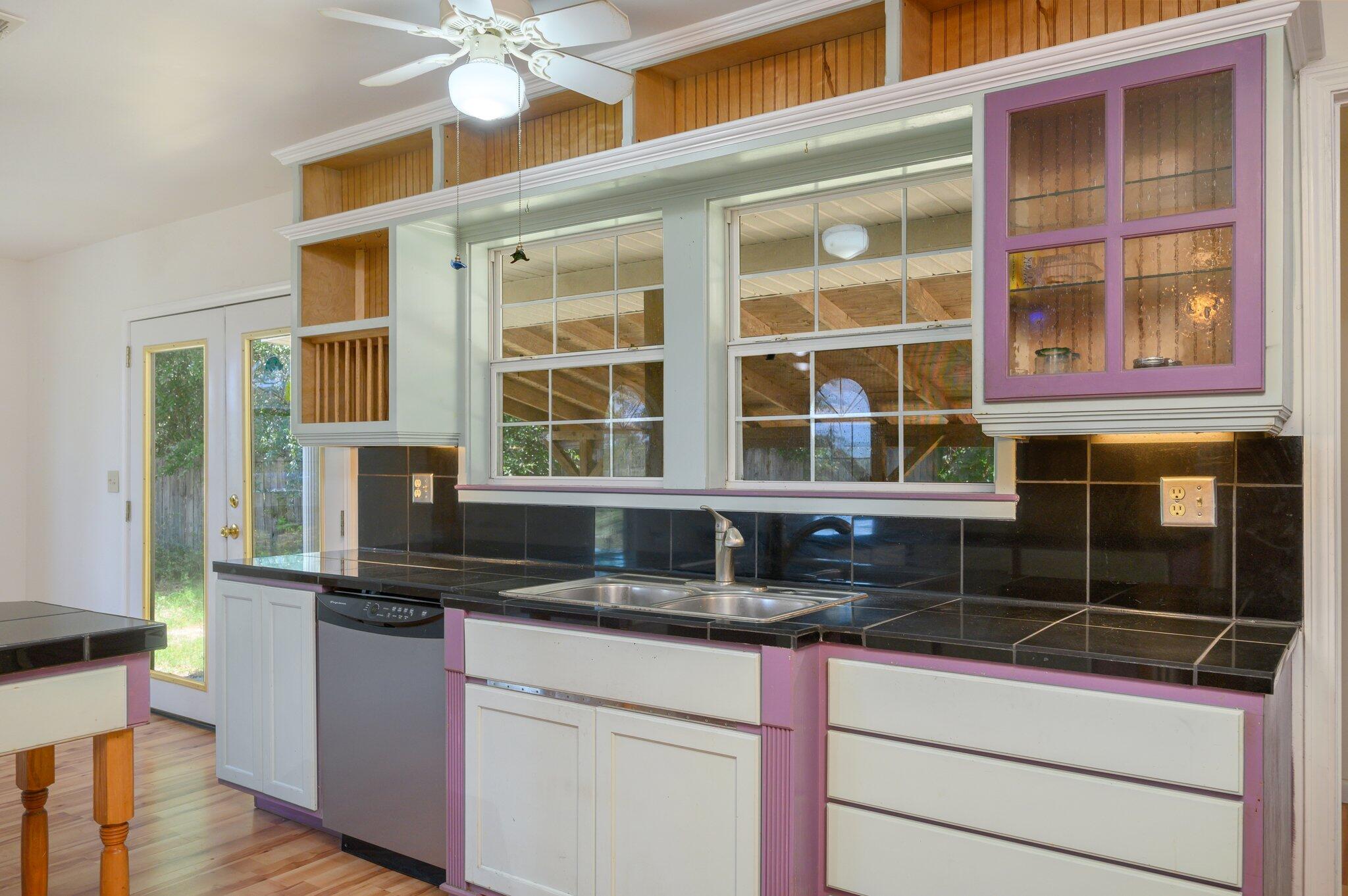 1361 Long Road DeFuniak Springs, FL 32433 - Photo 3 of 43 a kitchen with a refrigerator and a sink