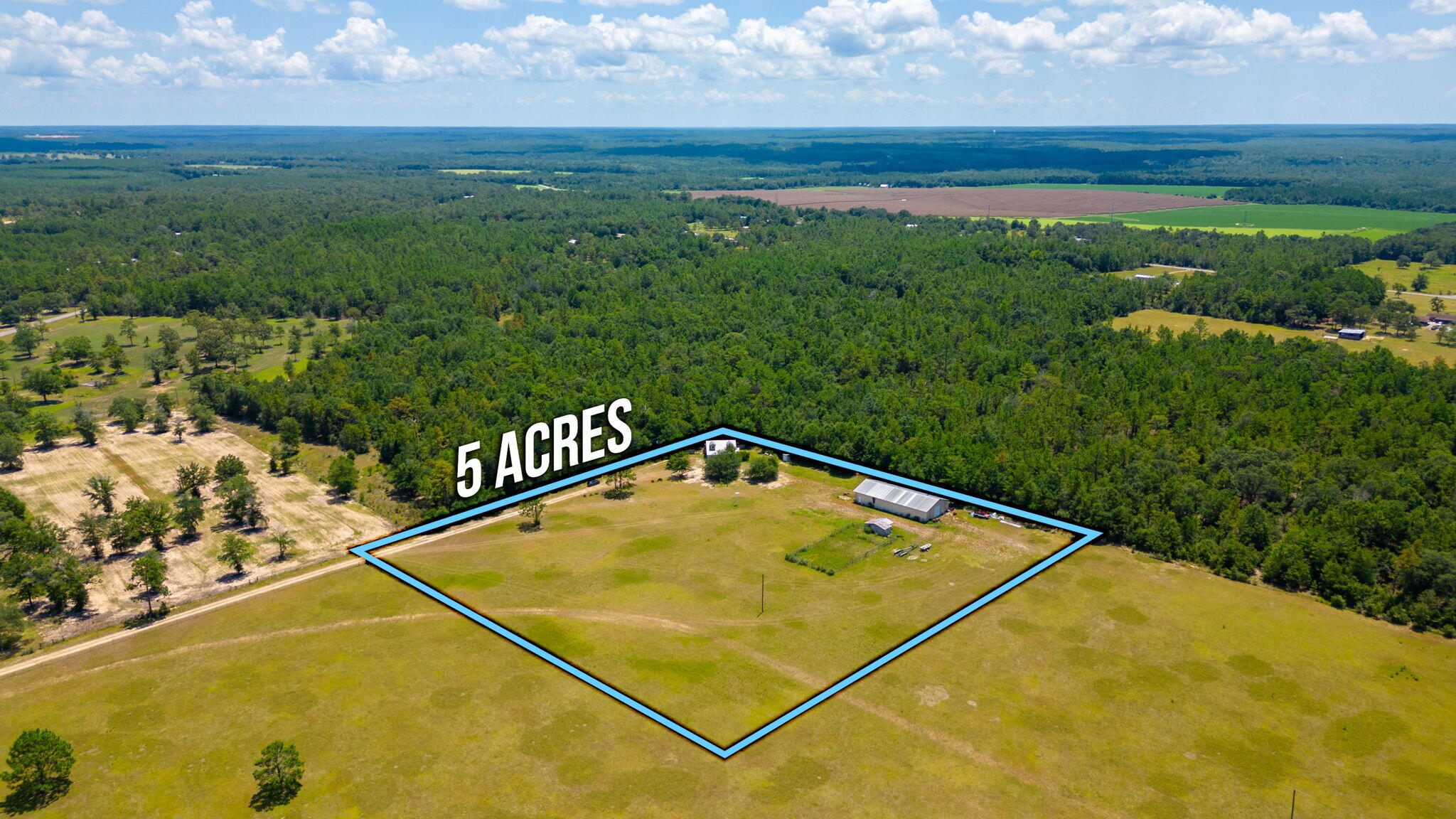 1361 Long Road DeFuniak Springs, FL 32433 - Photo 38 of 43 a view of a tennis court