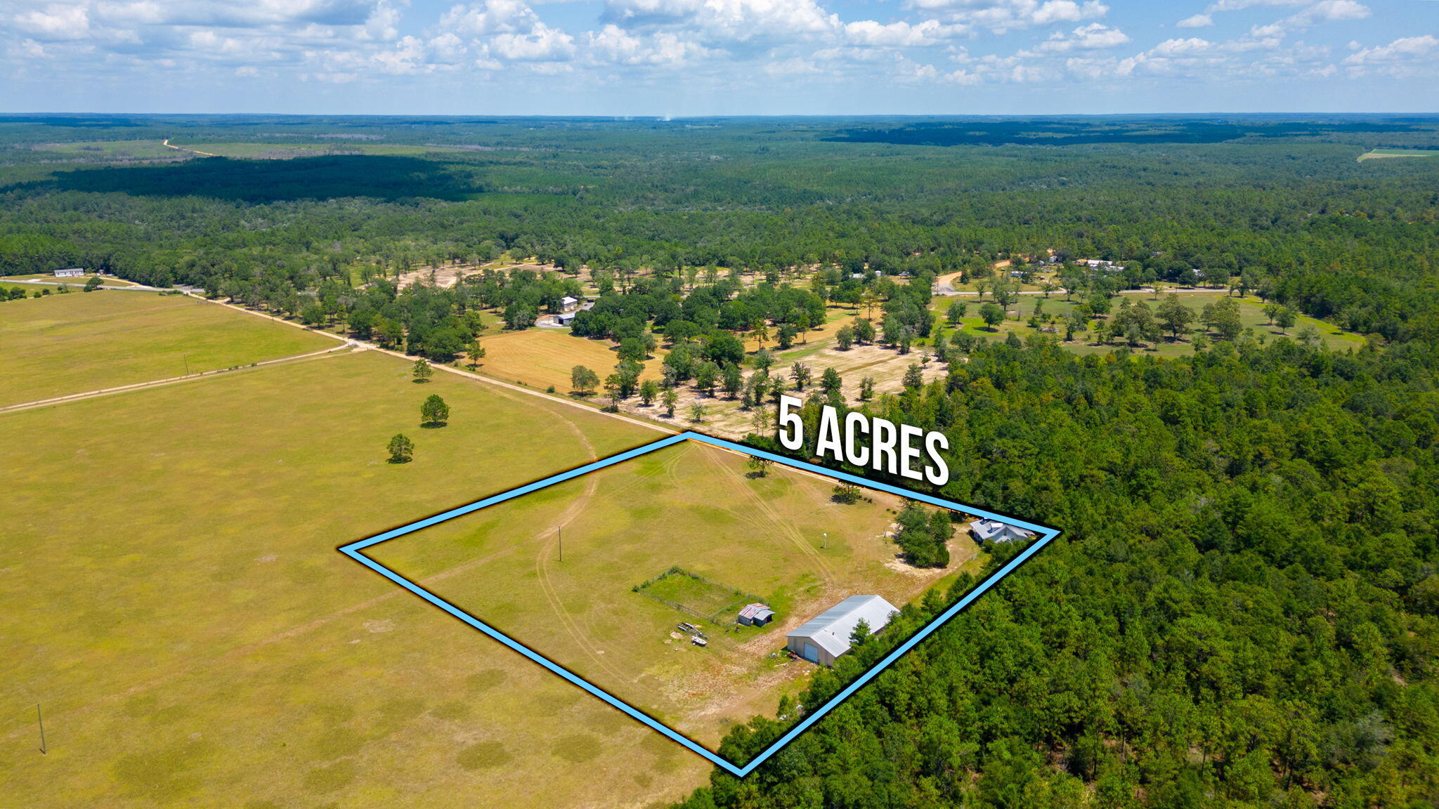 1361 Long Road DeFuniak Springs, FL 32433 - Photo 39 of 43 a view of a tennis court