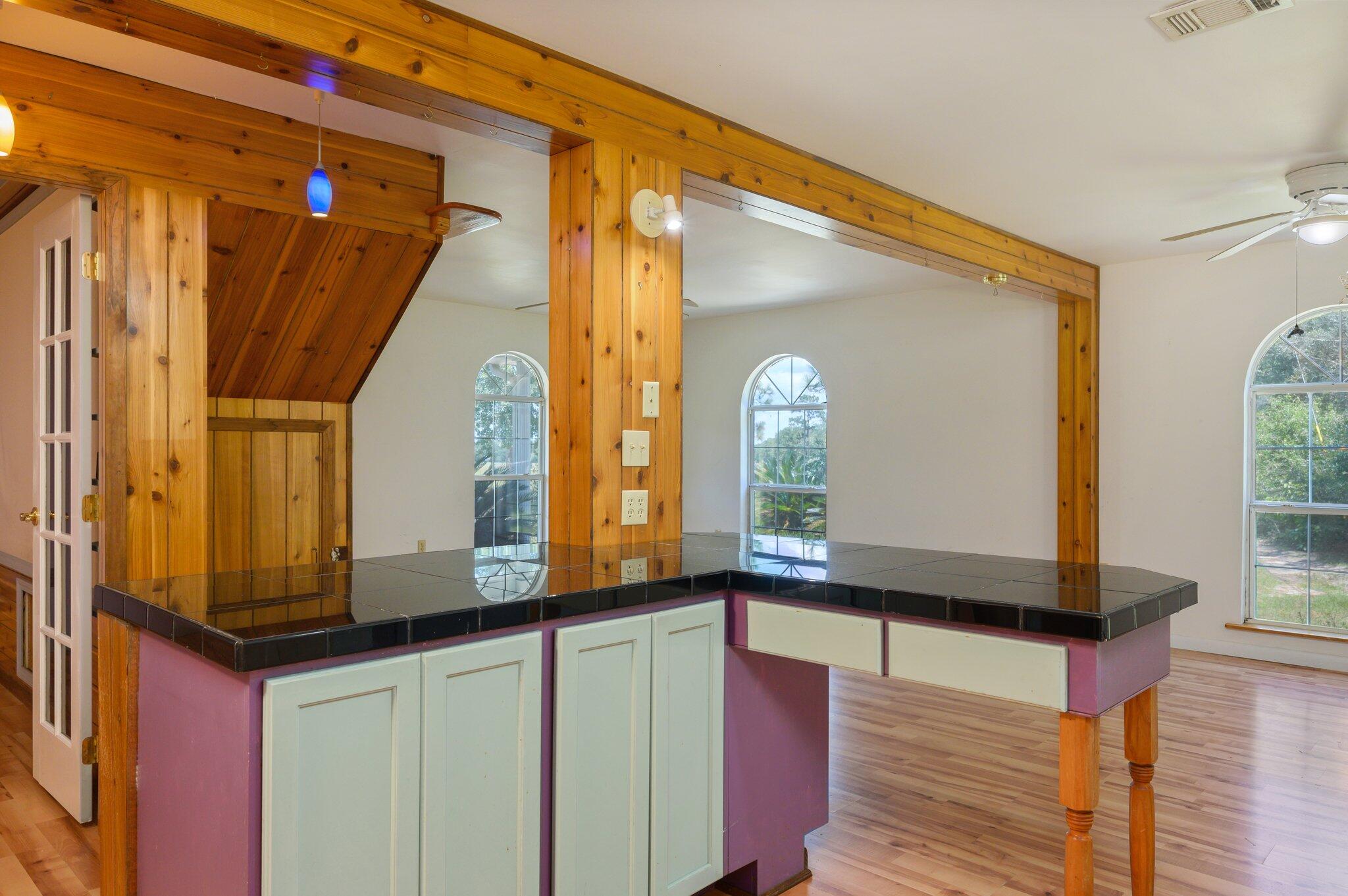 1361 Long Road DeFuniak Springs, FL 32433 - Photo 6 of 43 a bathroom with a mirror and a window