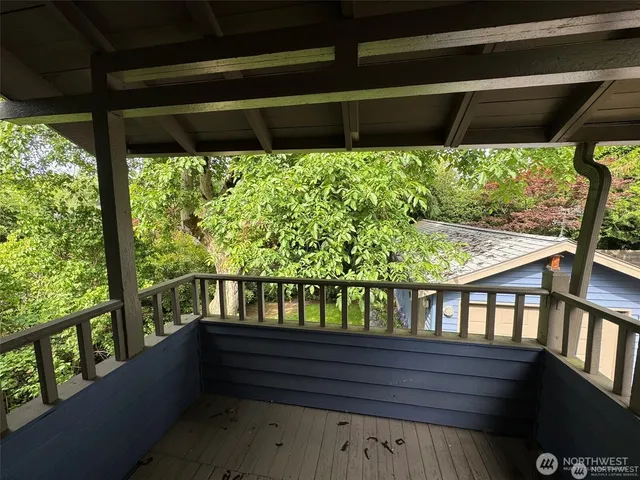 a view of porch with a yard