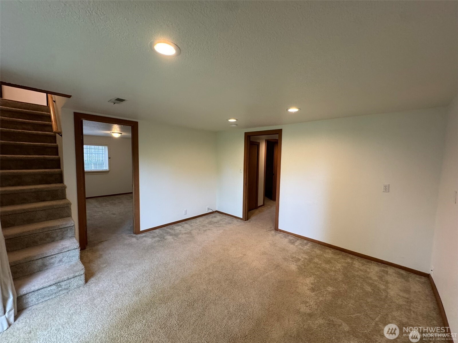 4521 49th Avenue Northeast Seattle, WA 98105 - Photo 14 of 20 a view of an empty room and window