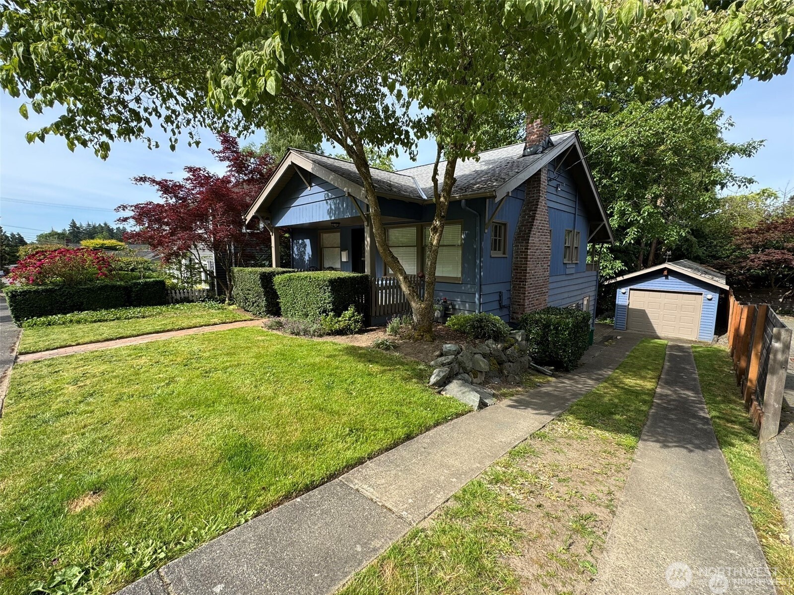 4521 49th Avenue Northeast Seattle, WA 98105 - Photo 18 of 20 a front view of a house with garden