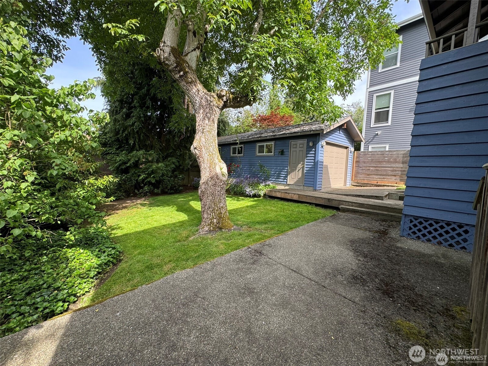 4521 49th Avenue Northeast Seattle, WA 98105 - Photo 20 of 20 a front view of a house with garden