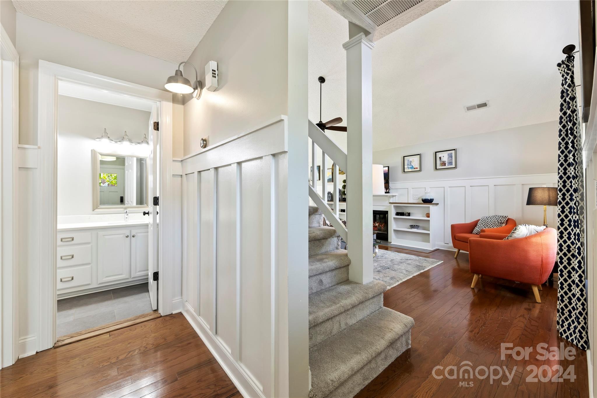 1313 Crown Ridge Drive Fort Mill, SC 29708 - Photo 13 of 35 a view of a hallway with entryway and wooden floors
