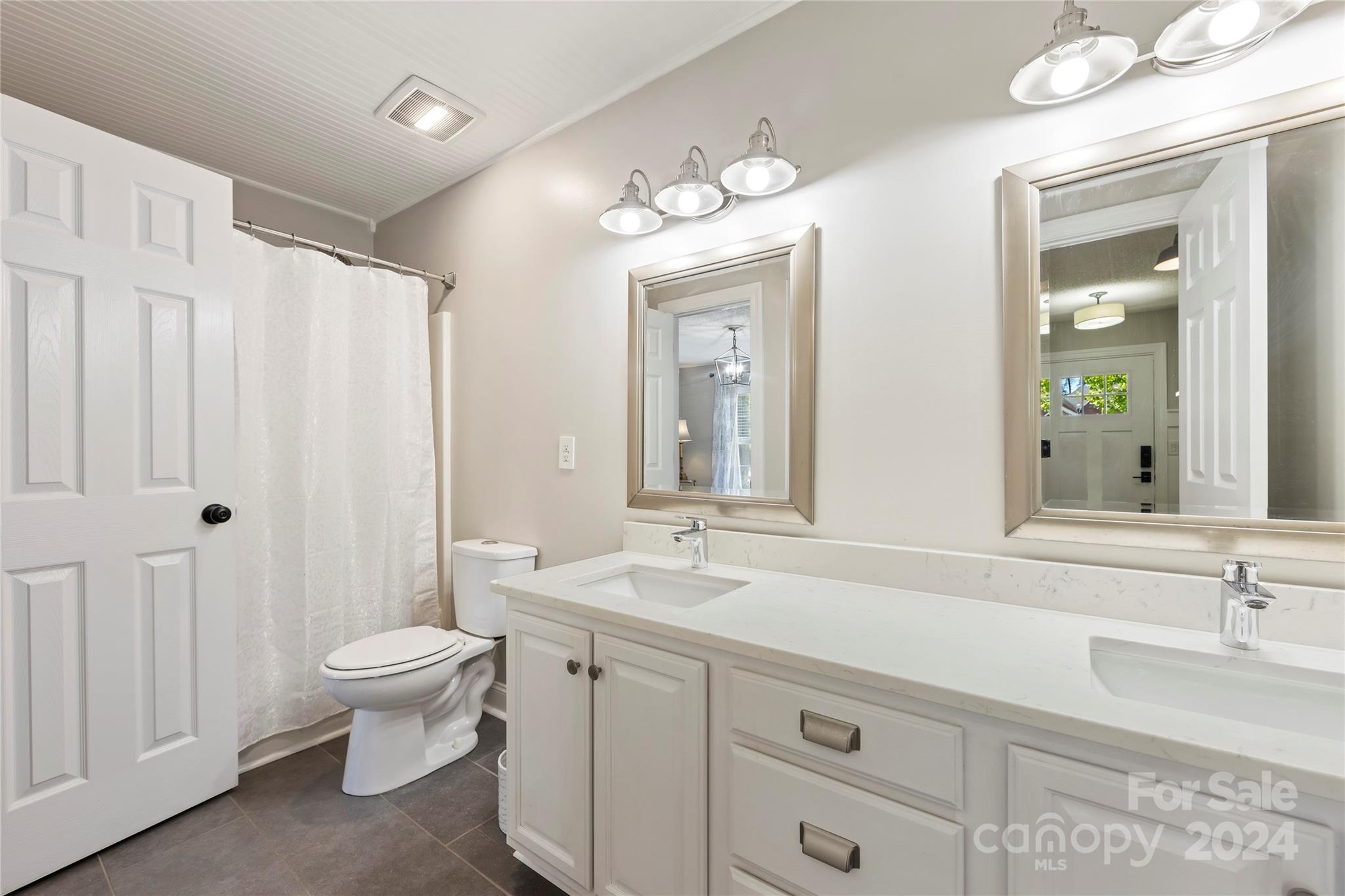 1313 Crown Ridge Drive Fort Mill, SC 29708 - Photo 16 of 35 a bathroom with a sink double vanity and a mirror