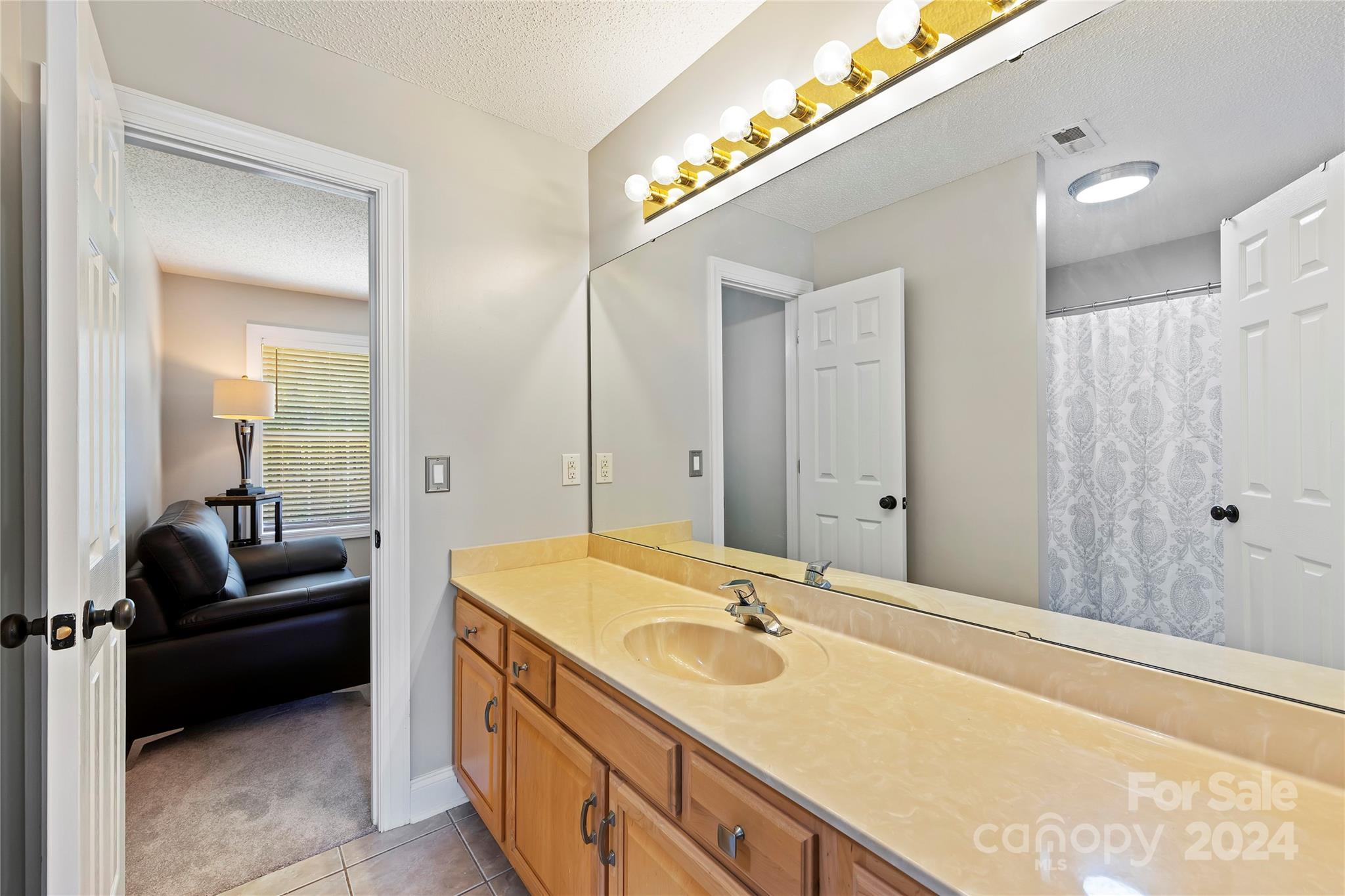 1313 Crown Ridge Drive Fort Mill, SC 29708 - Photo 21 of 35 a spacious bathroom with a double vanity sink a mirror and shower