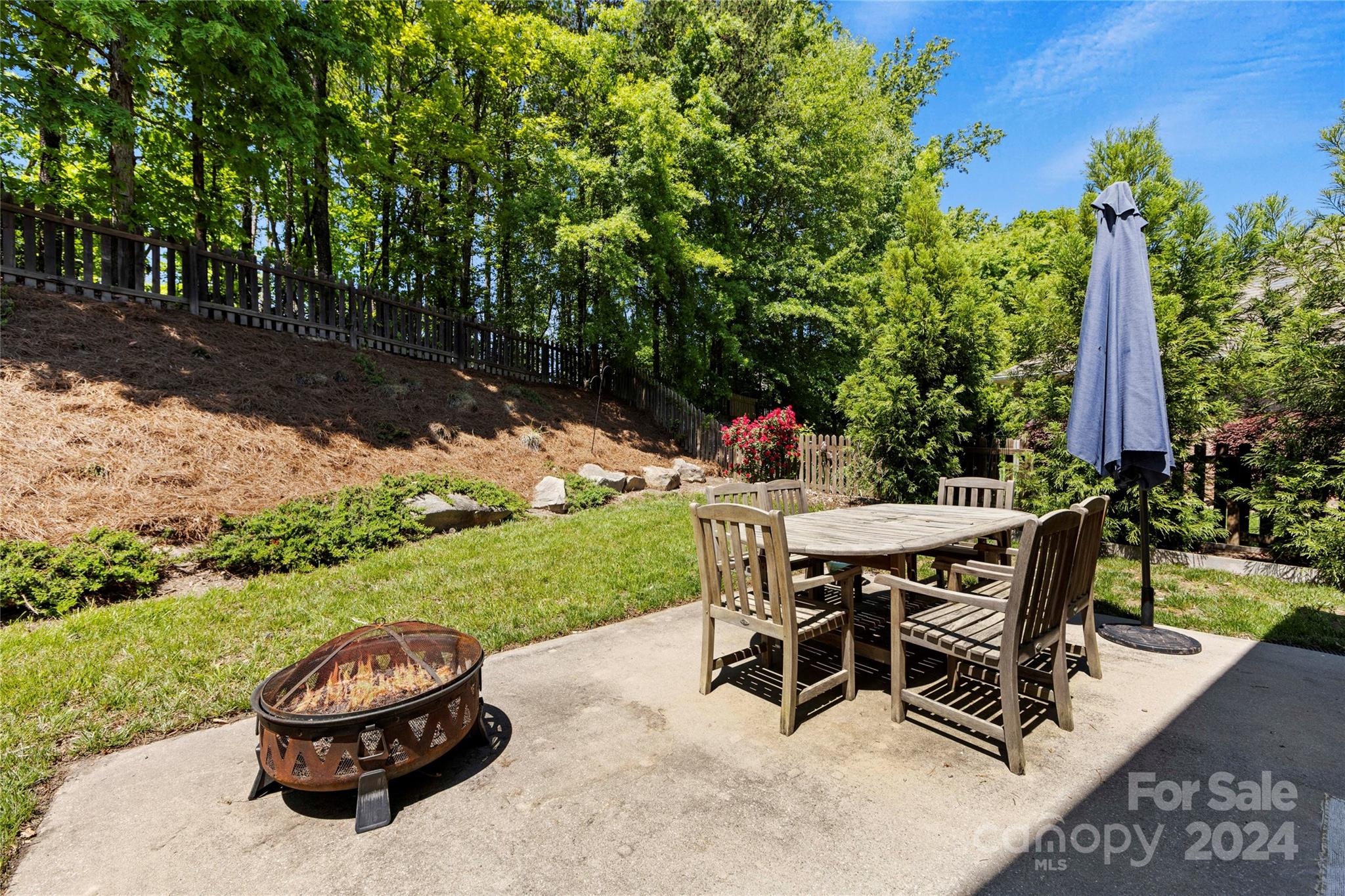 1313 Crown Ridge Drive Fort Mill, SC 29708 - Photo 25 of 35 a view of a backyard with sitting area and furniture