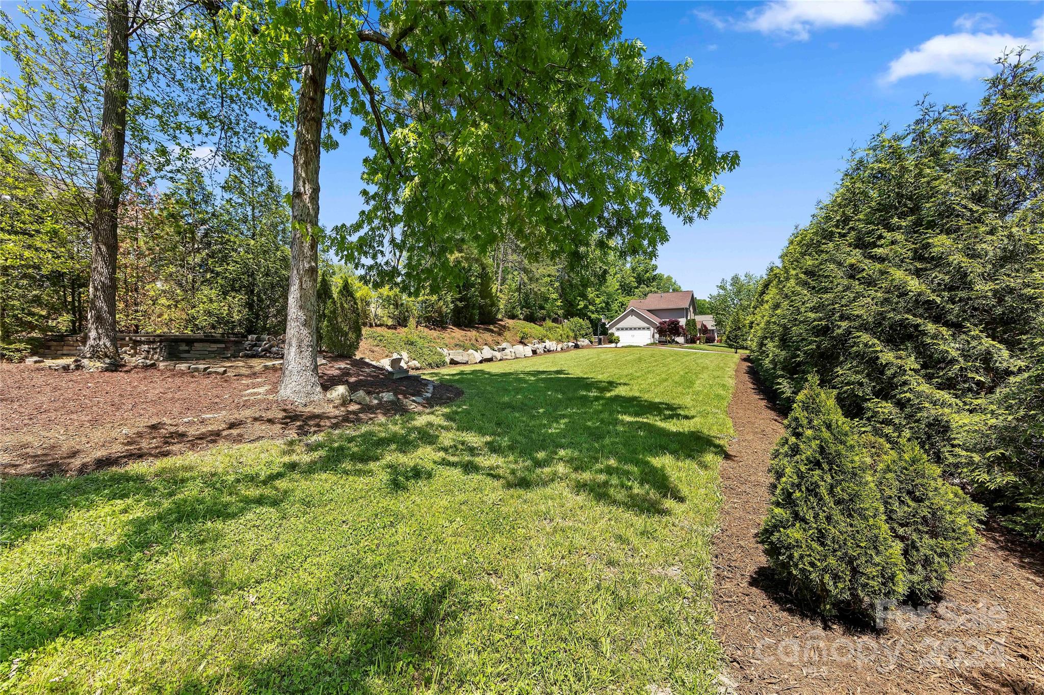 1313 Crown Ridge Drive Fort Mill, SC 29708 - Photo 30 of 35 a view of a tree in a yard