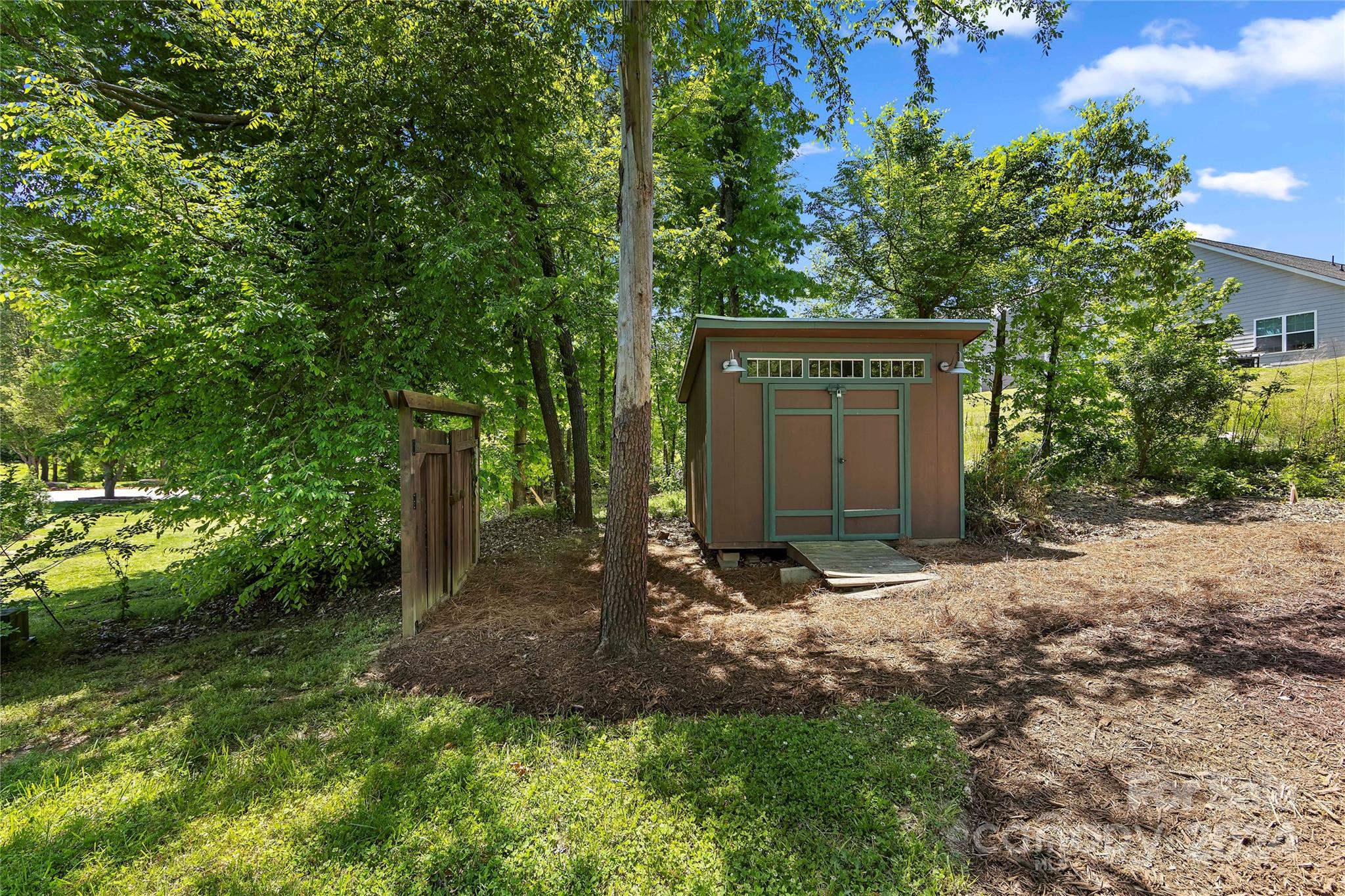1313 Crown Ridge Drive Fort Mill, SC 29708 - Photo 31 of 35 a view of a house with a yard and tree