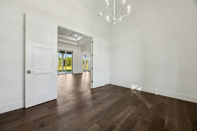 a kitchen with cabinets and window