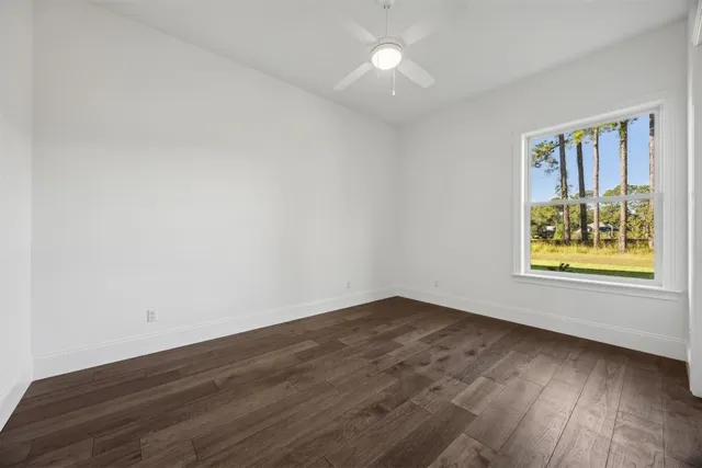 an aerial view of a house with a swimming pool yard and outdoor seating