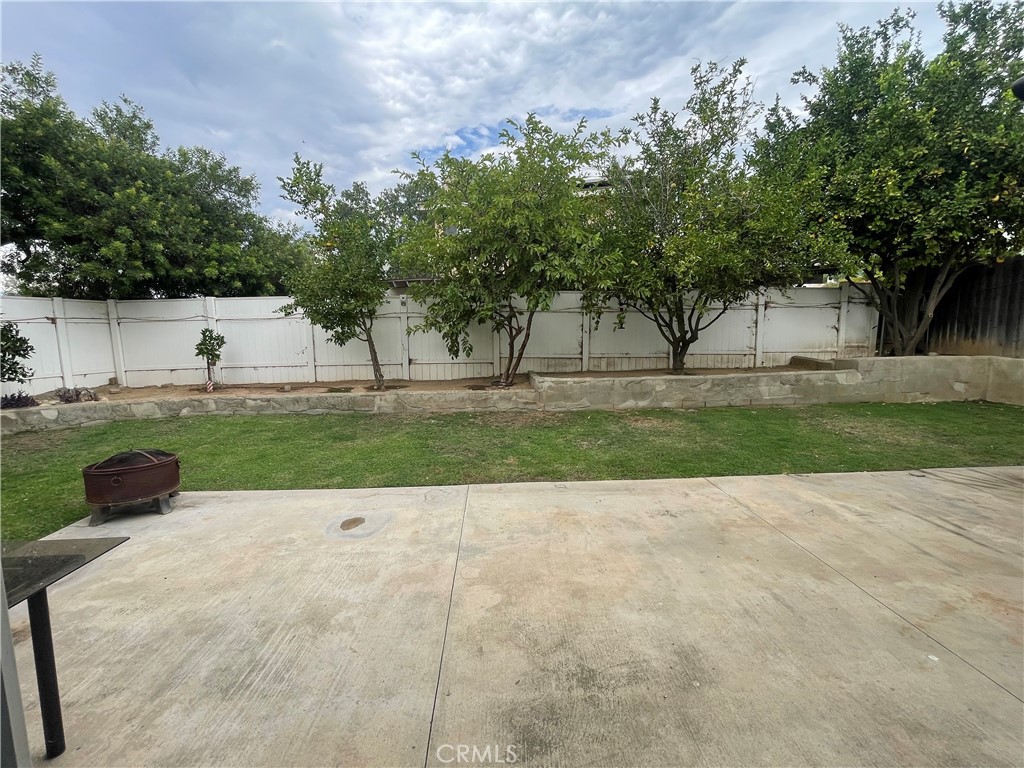 22740 Main Street Grand Terrace, CA 92313 - Photo 25 of 30 a view of a garden with a bench