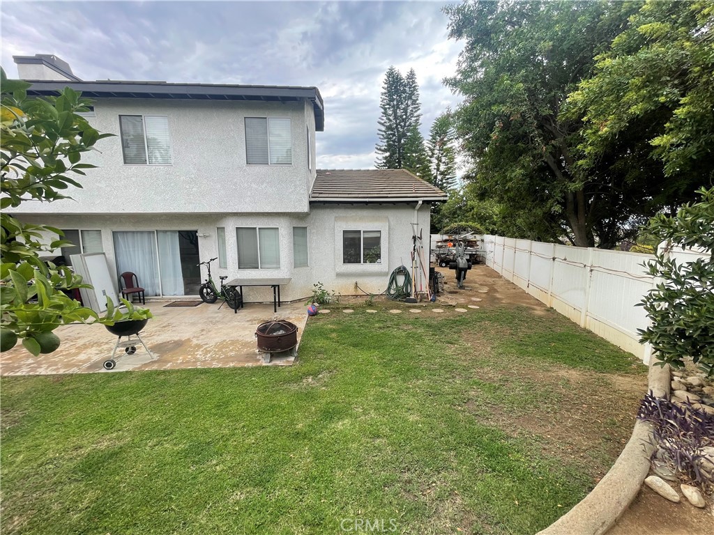 22740 Main Street Grand Terrace, CA 92313 - Photo 29 of 30 a view of a house with backyard and sitting area