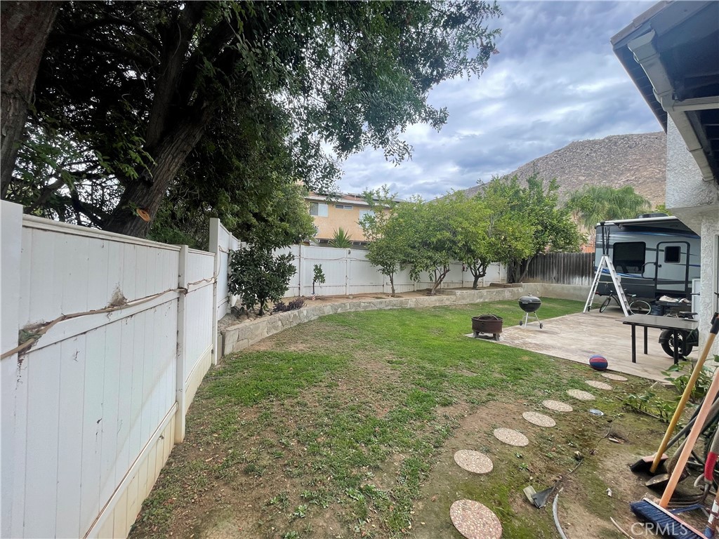 22740 Main Street Grand Terrace, CA 92313 - Photo 30 of 30 a view of a backyard with sitting area