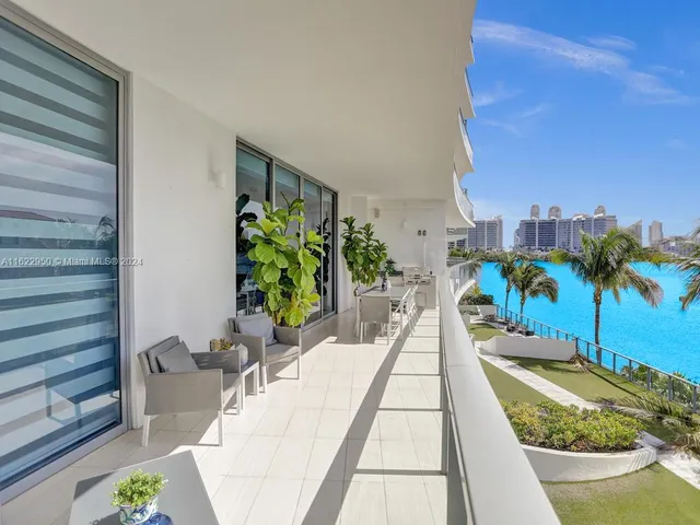 a bedroom with a bed and a table in it