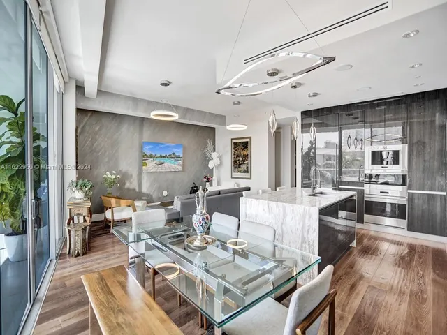 a view of hallway with wooden floor