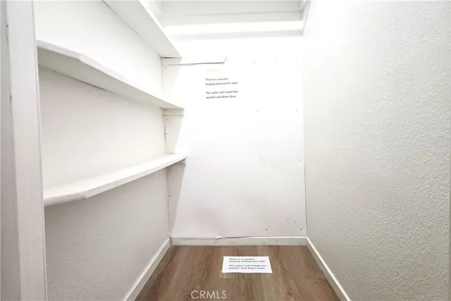 a view of small space with wooden floor