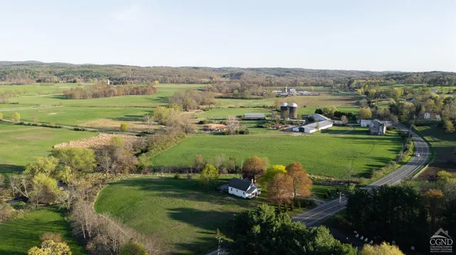 an aerial view of a golf course with outdoor space