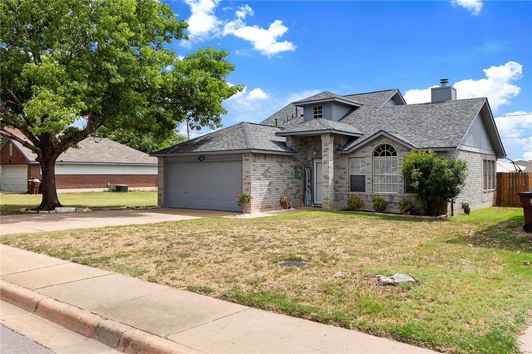 1805 Rustlers Road Round Rock, TX 78681 - Photo 1 of 1 a front view of a house with a yard