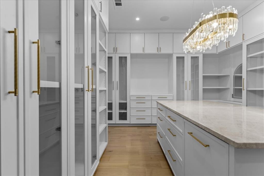 10576 Buccaneer Point Frisco, TX 75036 - Photo 24 of 40 a view of a kitchen cabinets and a hallway