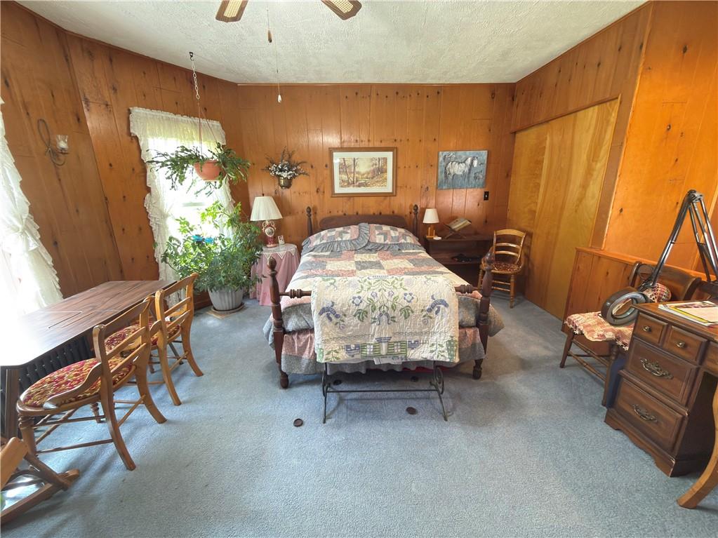 122 Coal Bank Road Greenville, PA 16125 - Photo 41 of 50 a bed room with a bed and a chair